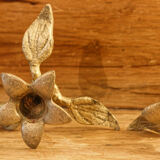 Pair of brass candle holders, flowers