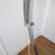 Lampadaire arc Guzzini alu chrome travertin