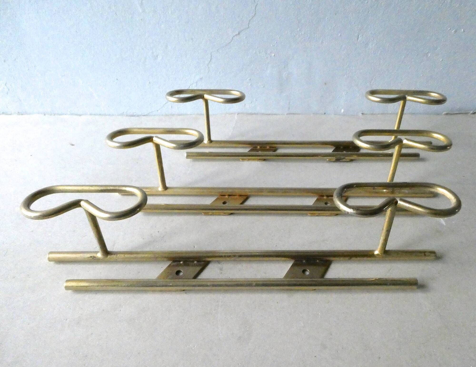 Set of 3 coat hangers in gold metal, 60s