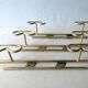 Set of 3 coat hangers in gold metal, 60s