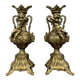 large Pair of cassolettes with putti in gilded bronze