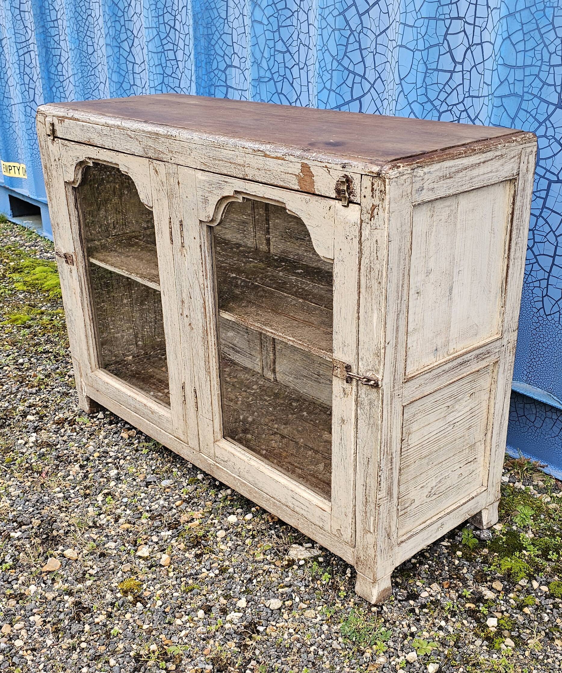 Vintage glass-fronted teak sideboard
