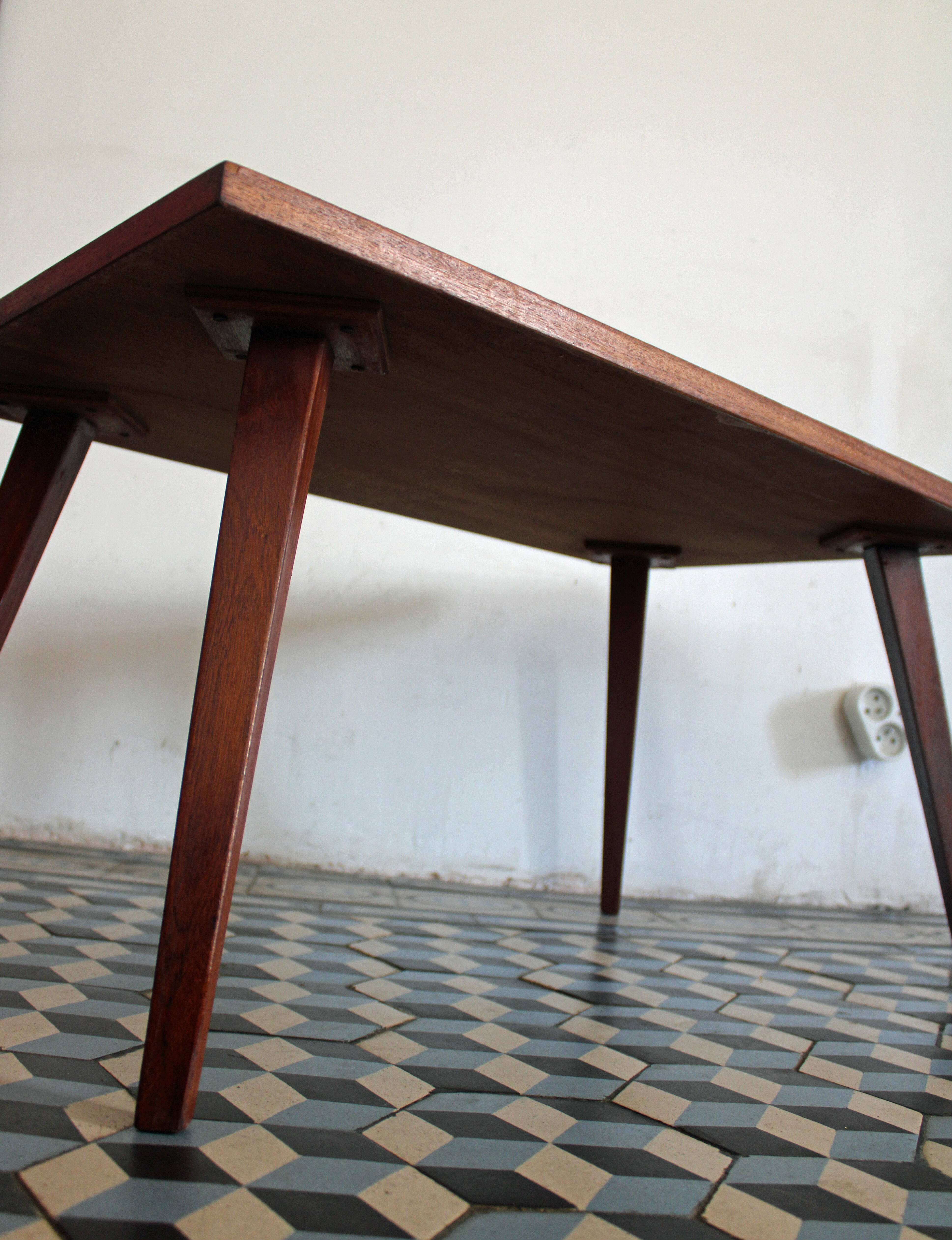 Teak coffee table with compass feet