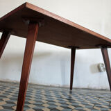 Teak coffee table with compass feet