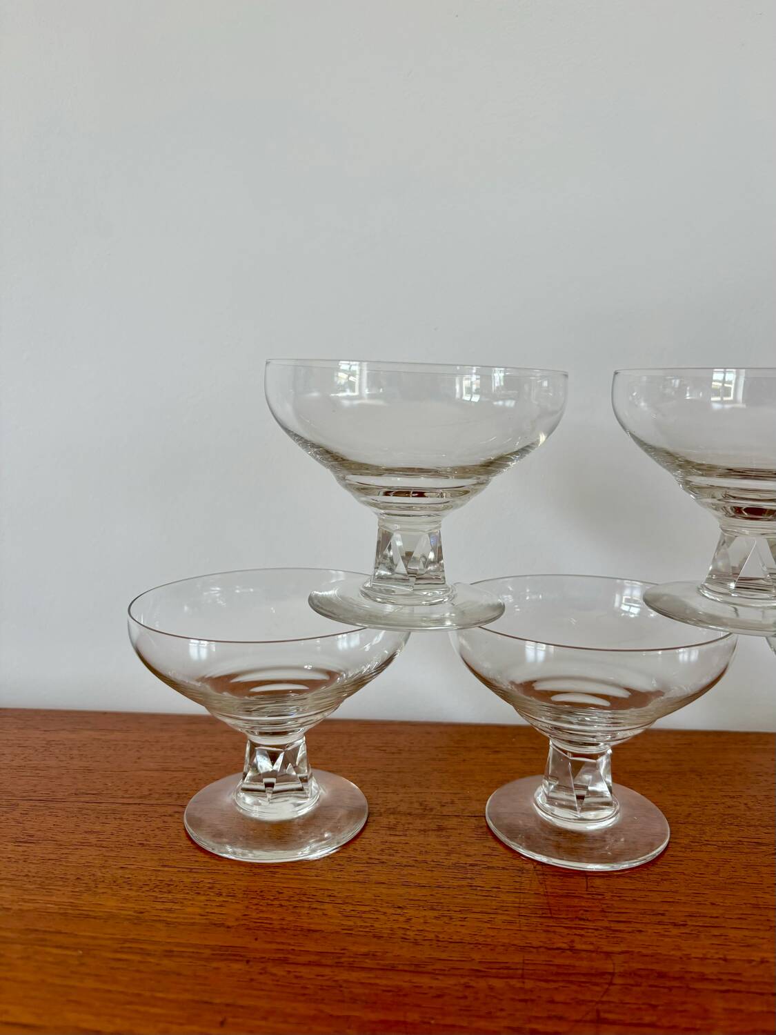 set of 5 crystal champagne glasses, worked and faceted feet, 1960