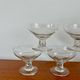 set of 5 crystal champagne glasses, worked and faceted feet, 1960
