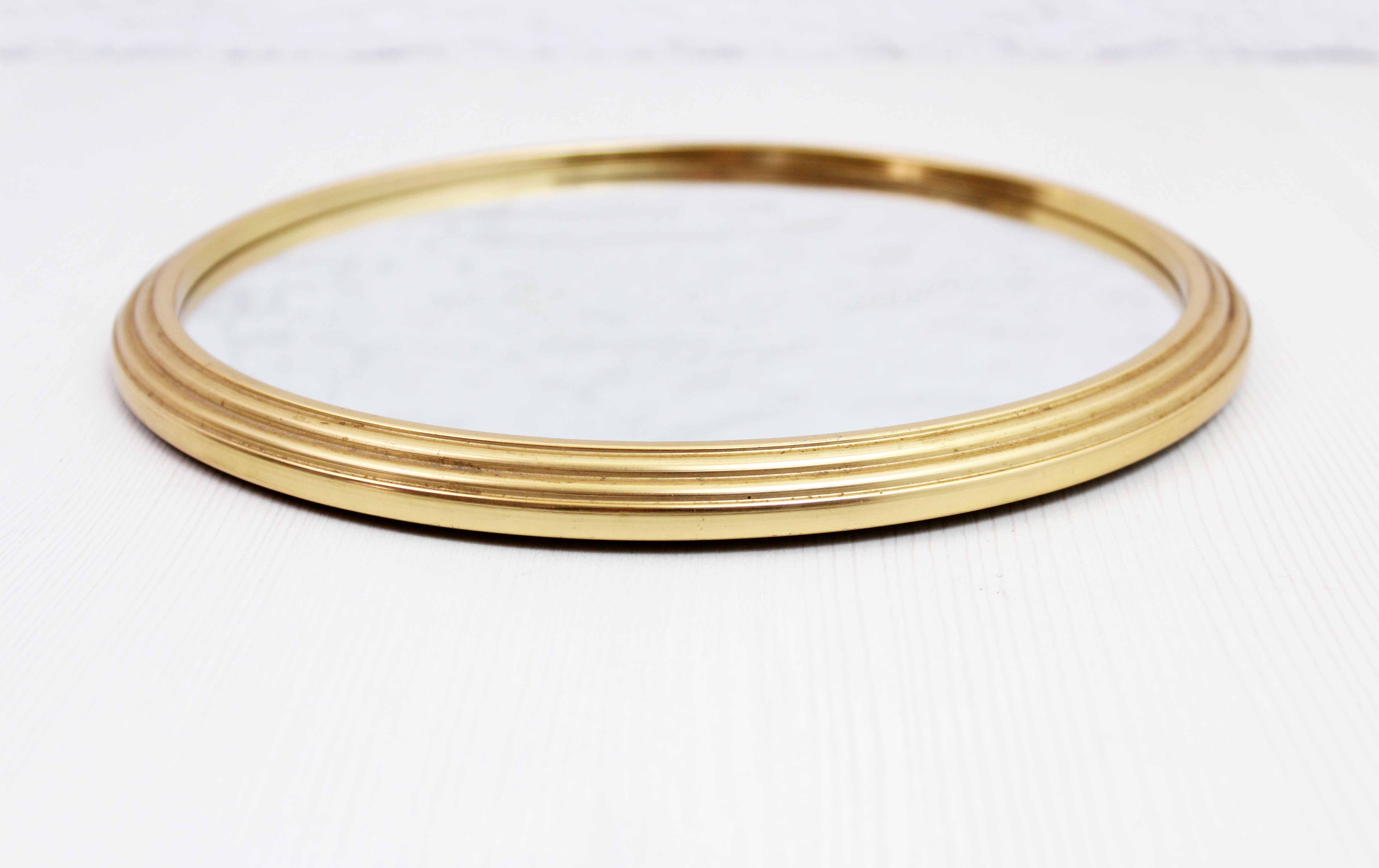 Round brass mirror top