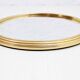 Round brass mirror top
