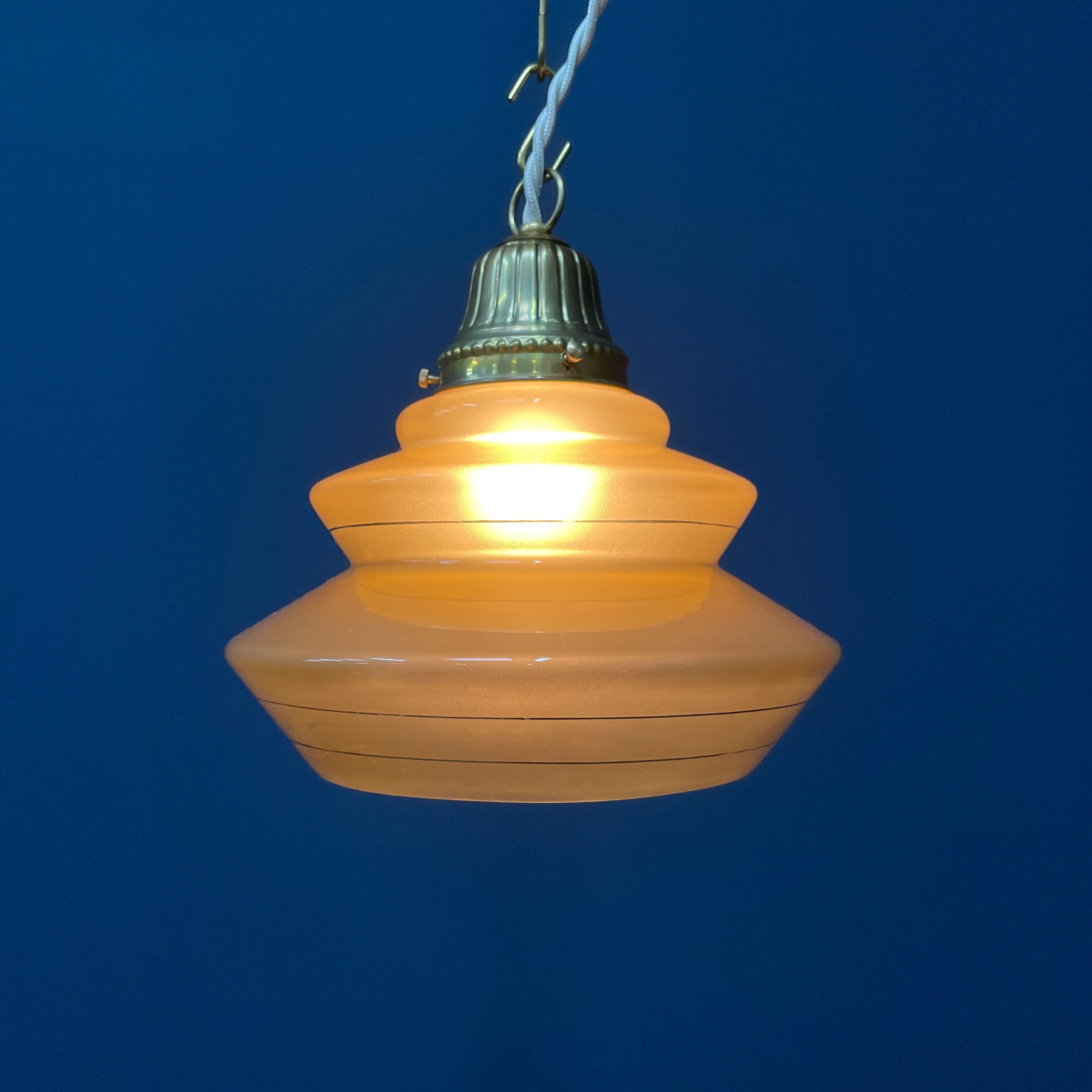 Vintage ocher glass hanging lamps with brass gallery