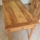 Old farmhouse table made of solid walnut wood.
