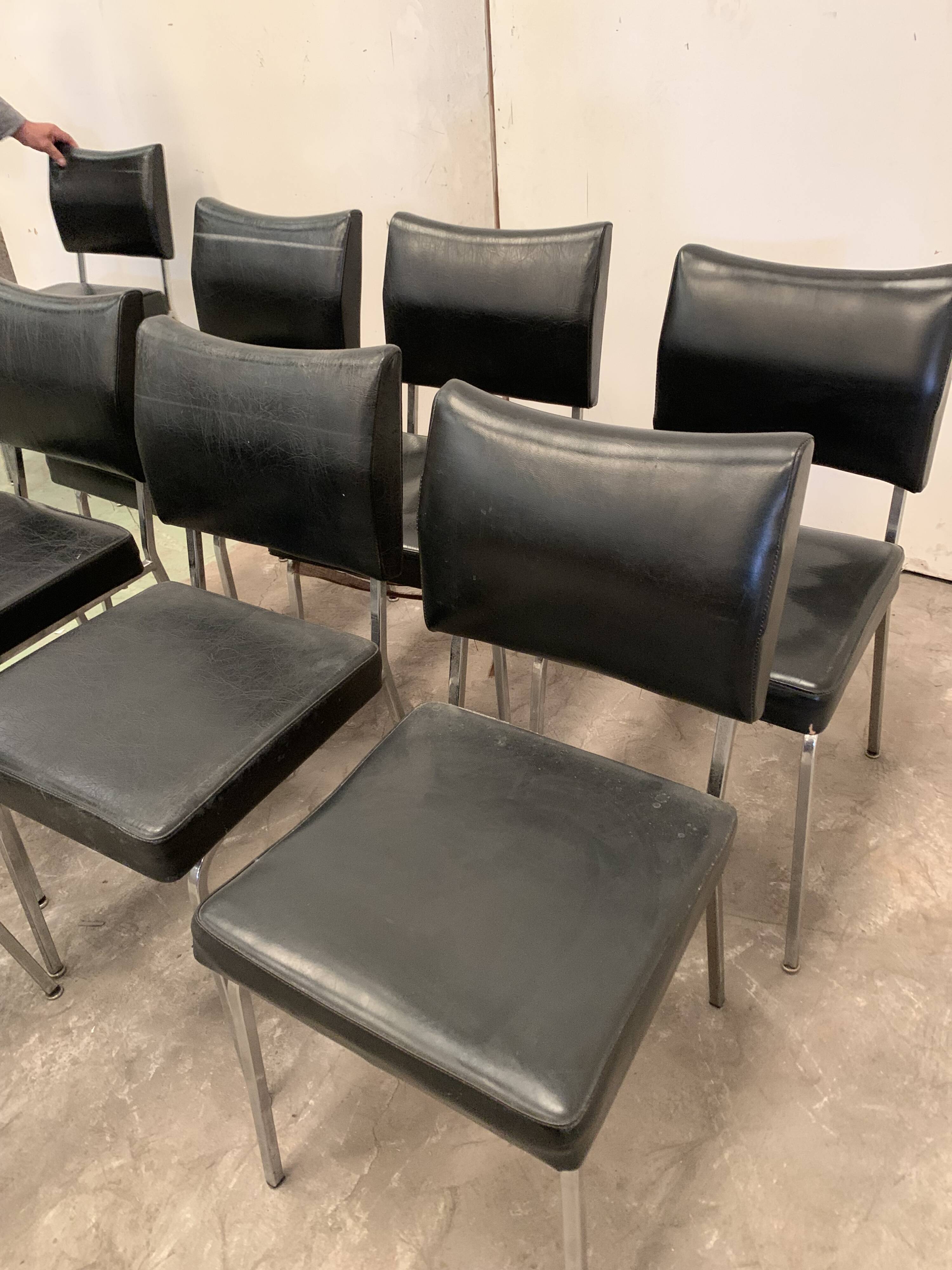 Suite of nine vintage chairs in chrome and imitation leather XX century