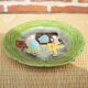 Old slipware plate: couple of peasants