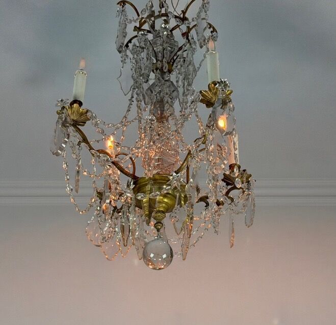 Bronze chandelier with cut crystal pendants, circa 1800.