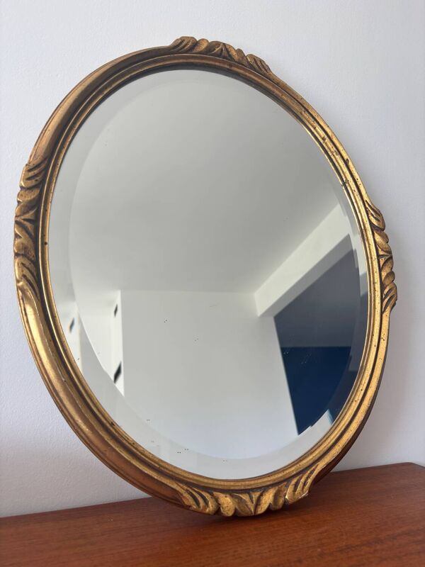 Miroir ovale ancien en bois et stuc doré style Louis XV