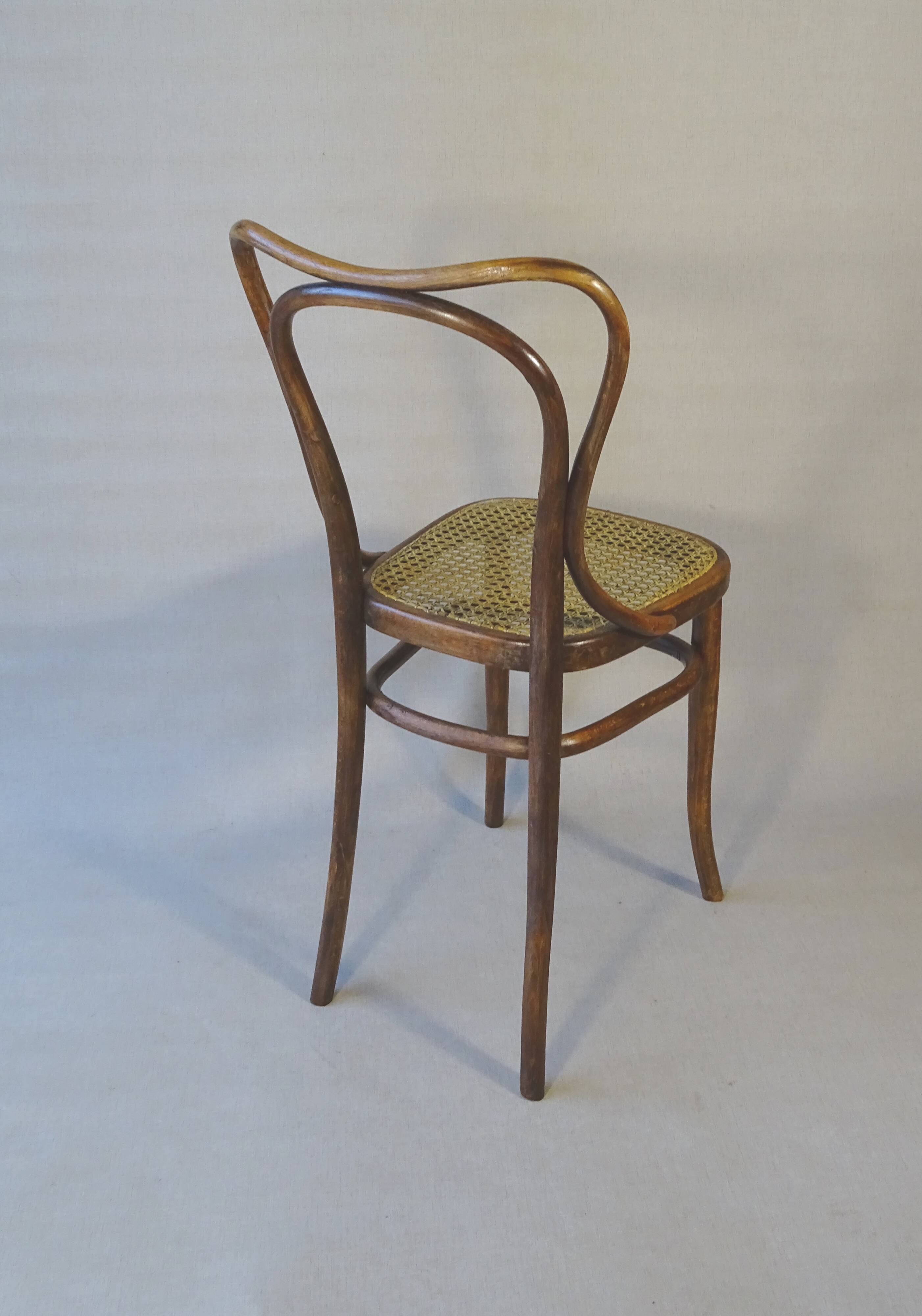 2 Bistro chairs No. 55- 3/4 by Kohn, circa 1905, caned