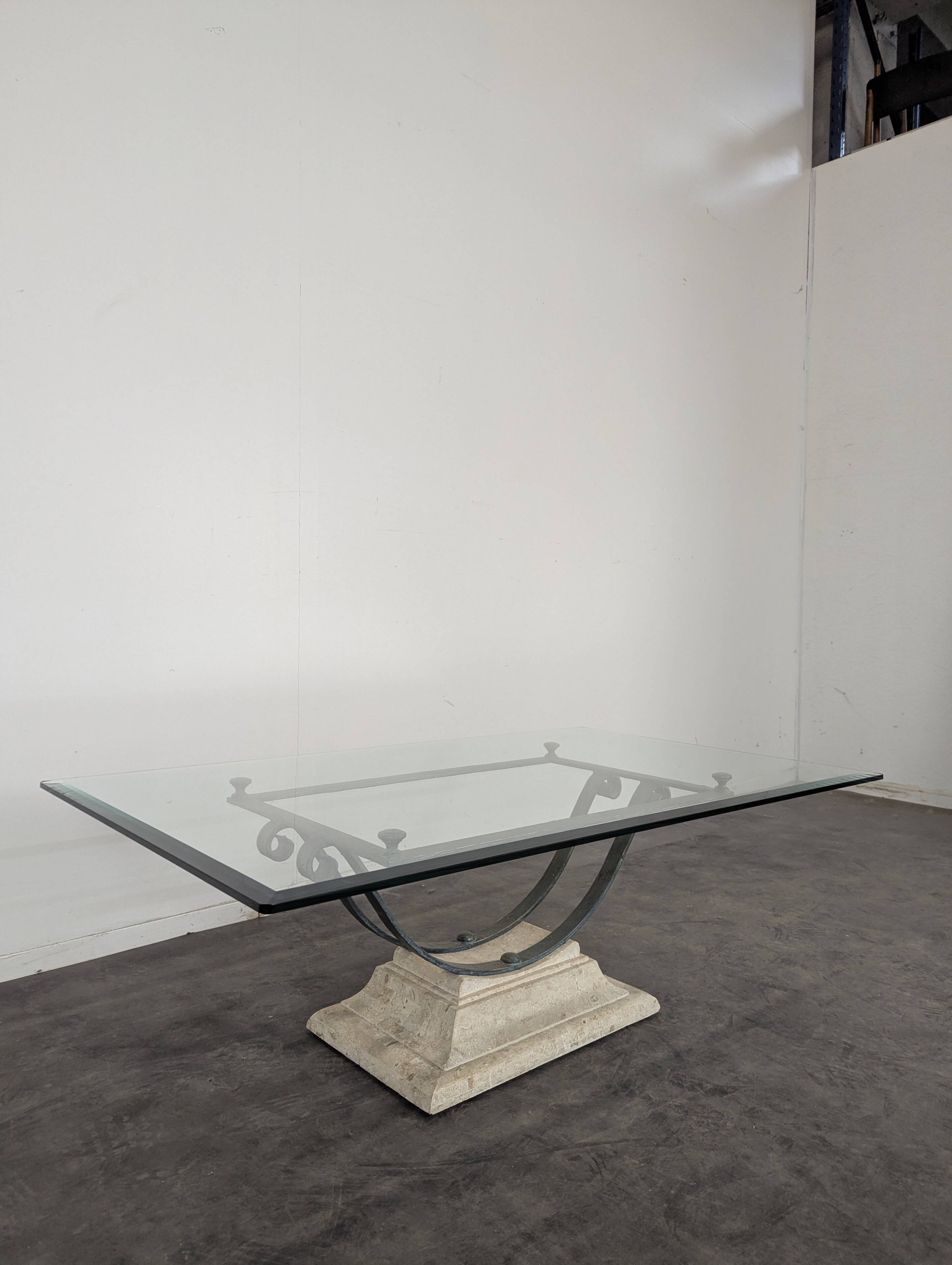 1980s coffee table with a travertine style and glass top.