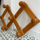 Pine accordion coat rack