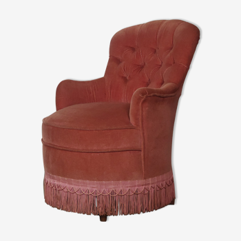Pink velvet upholstered toad armchair
