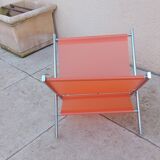 Vintage chrome and orange magazine rack from the 70s and 80s
