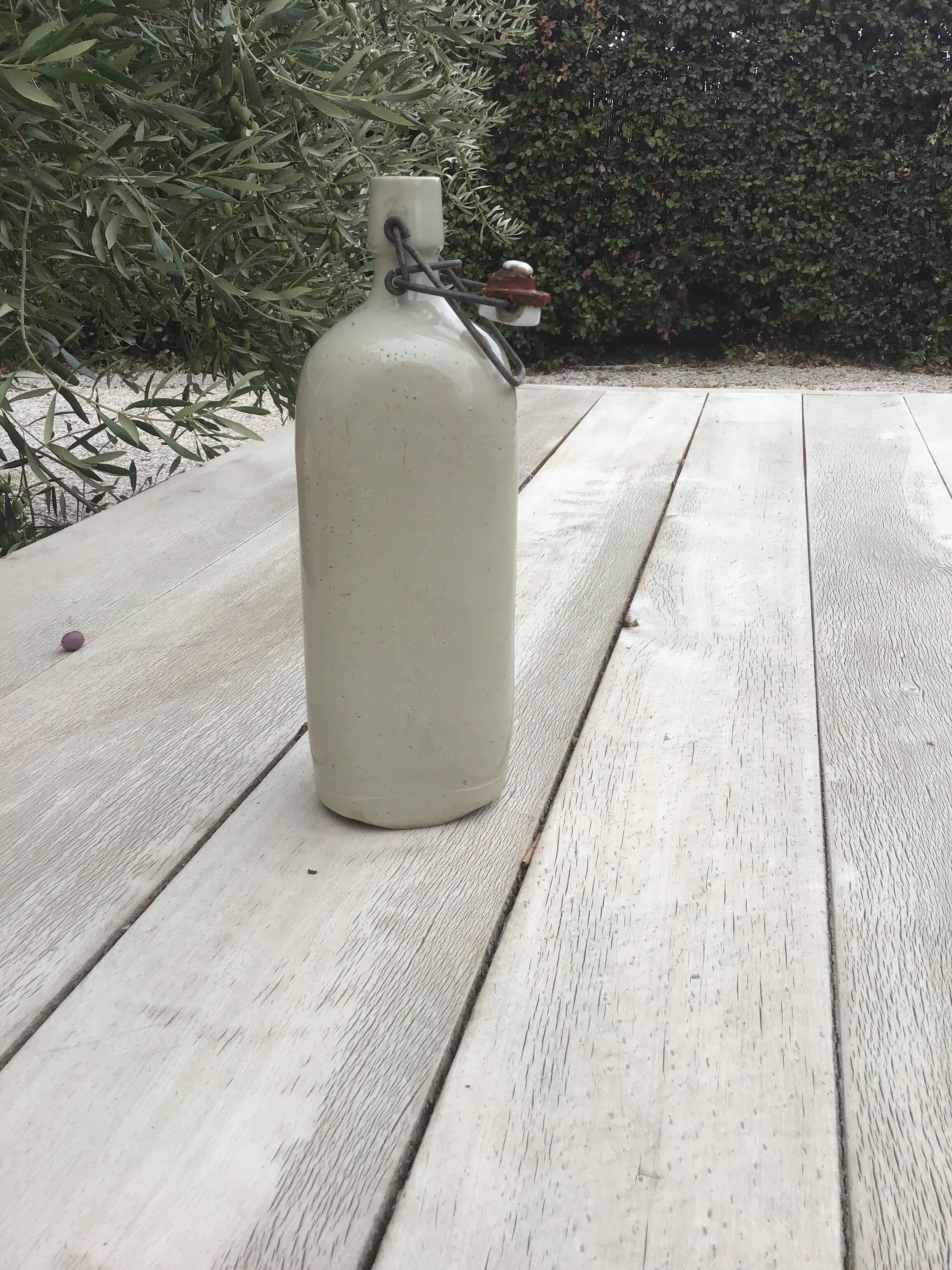 Triangle shaped sandstone bottle