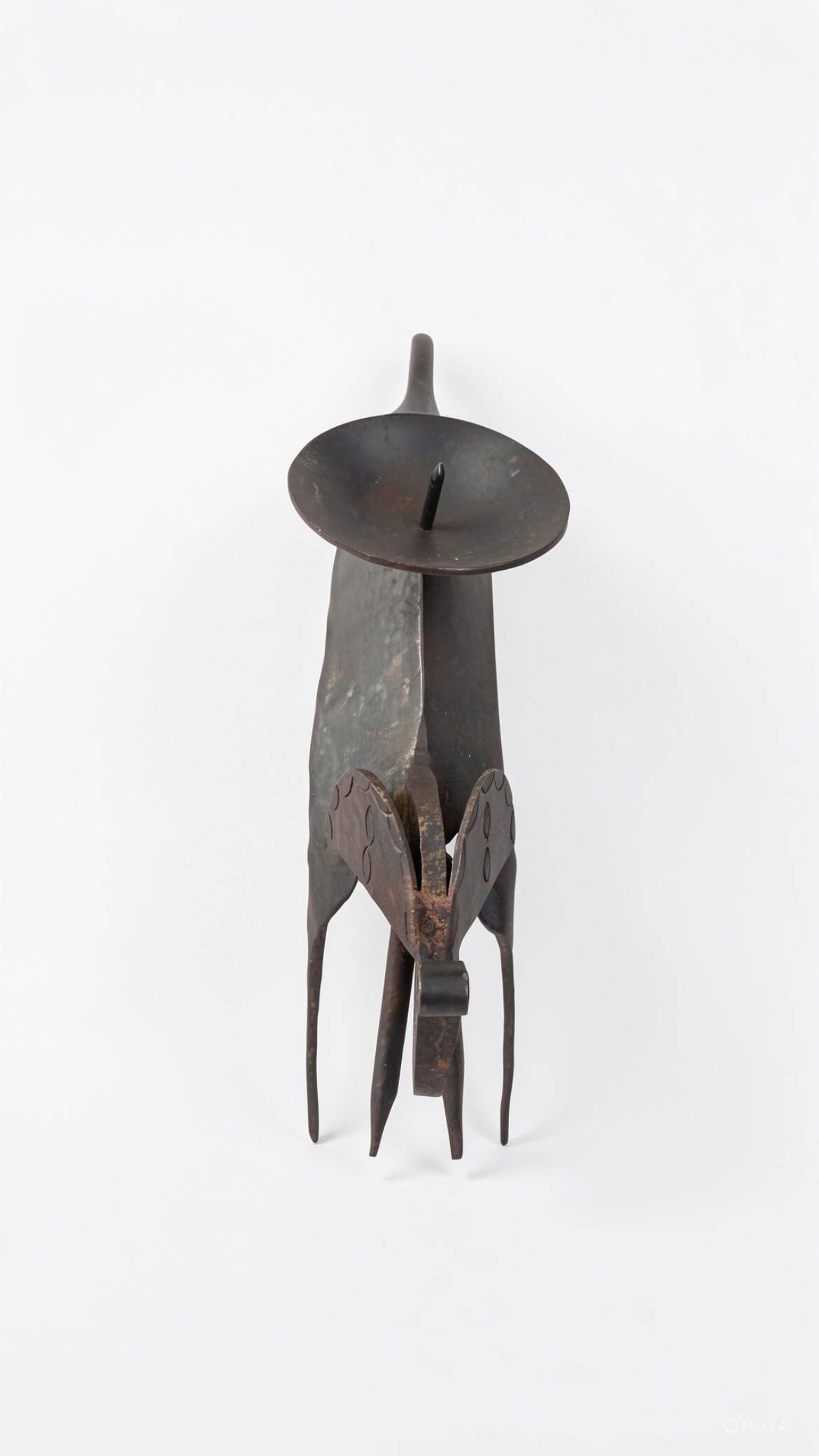 Zoomorphic candle holder in African wrought iron