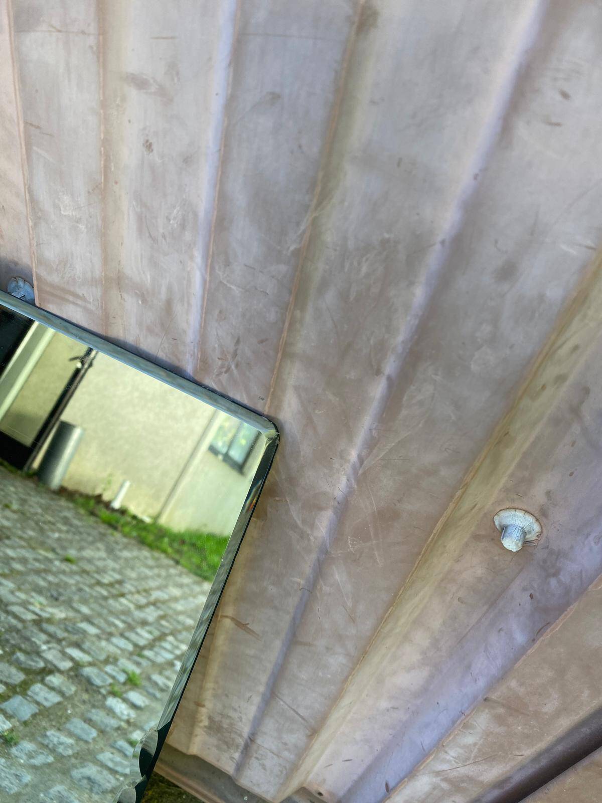 Bistro brasserie mirror, sculpted and bevelled, 1980, 228x80cm.