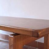 Large solid retractable coffee table