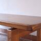 Large solid retractable coffee table