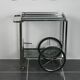 Furniture serves chrome metal and stainless steel 1960s rolling bar