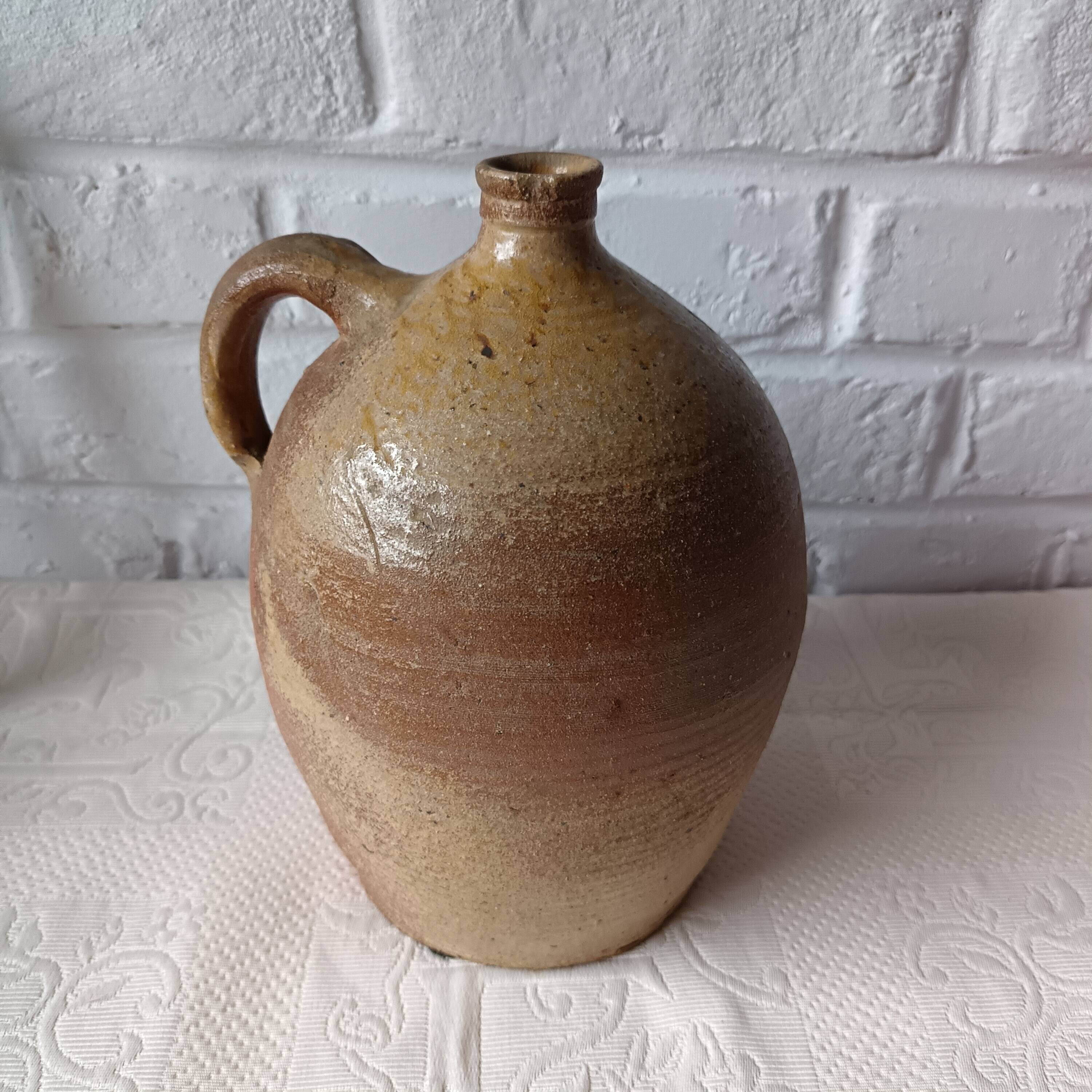 Old beige-brown stoneware jar France
