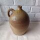 Old beige-brown stoneware jar France