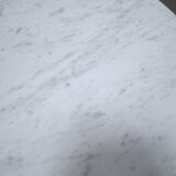 Round marble tulip table by E. Saarinen for Knoll International Editions