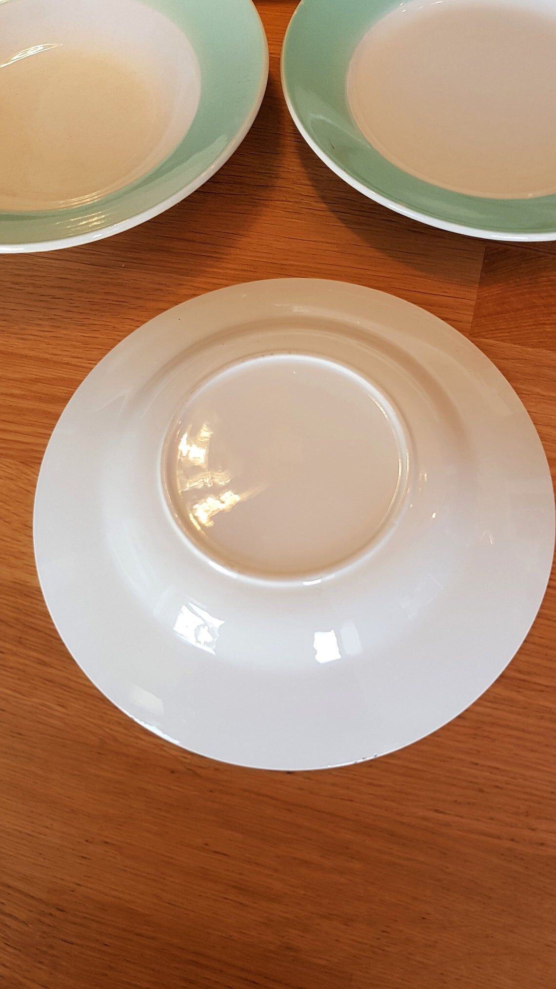 Lot of 4 green and white plates