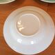 Lot of 4 green and white plates