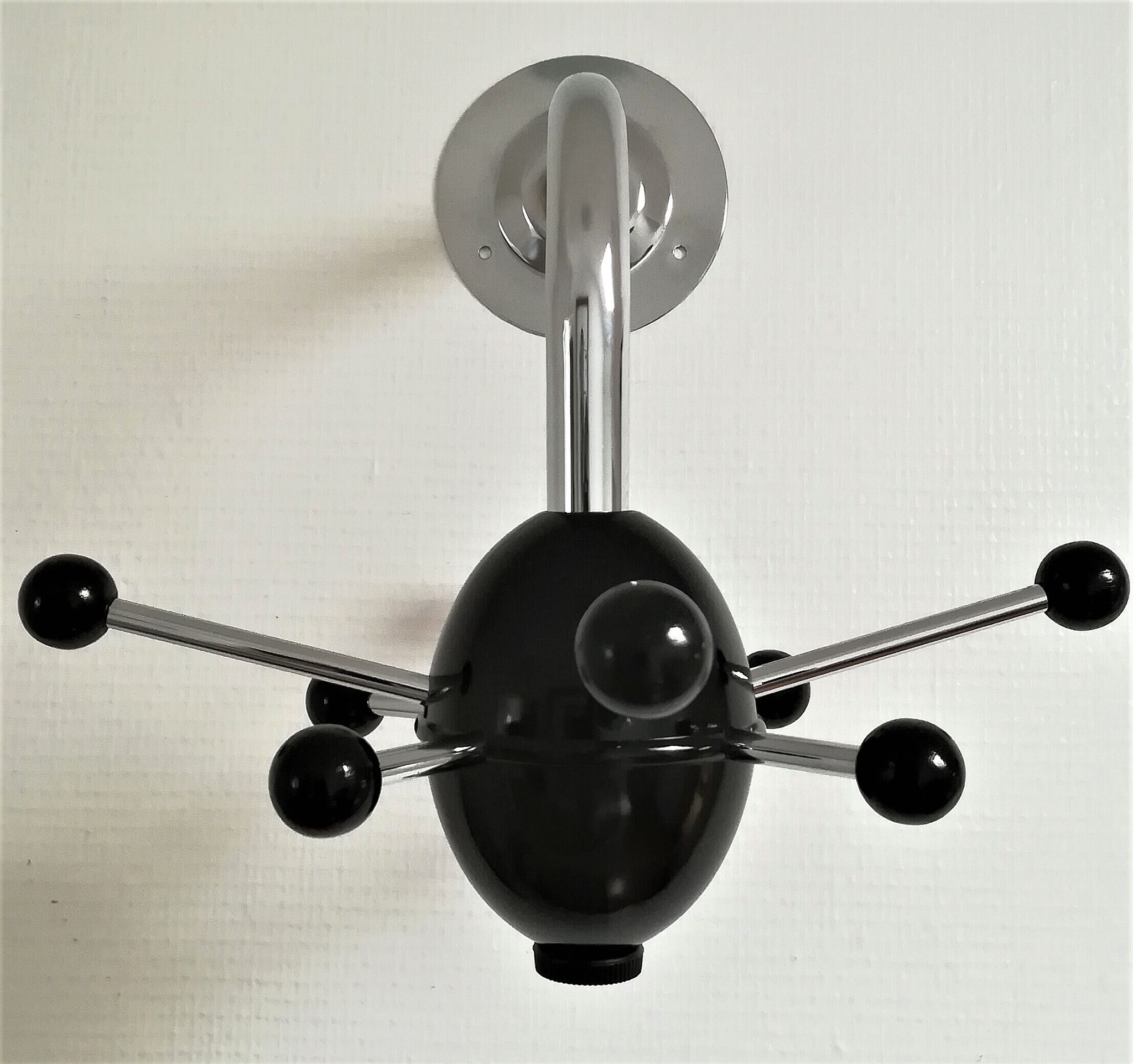 Black Sputnik coat rack and chrome 80s design