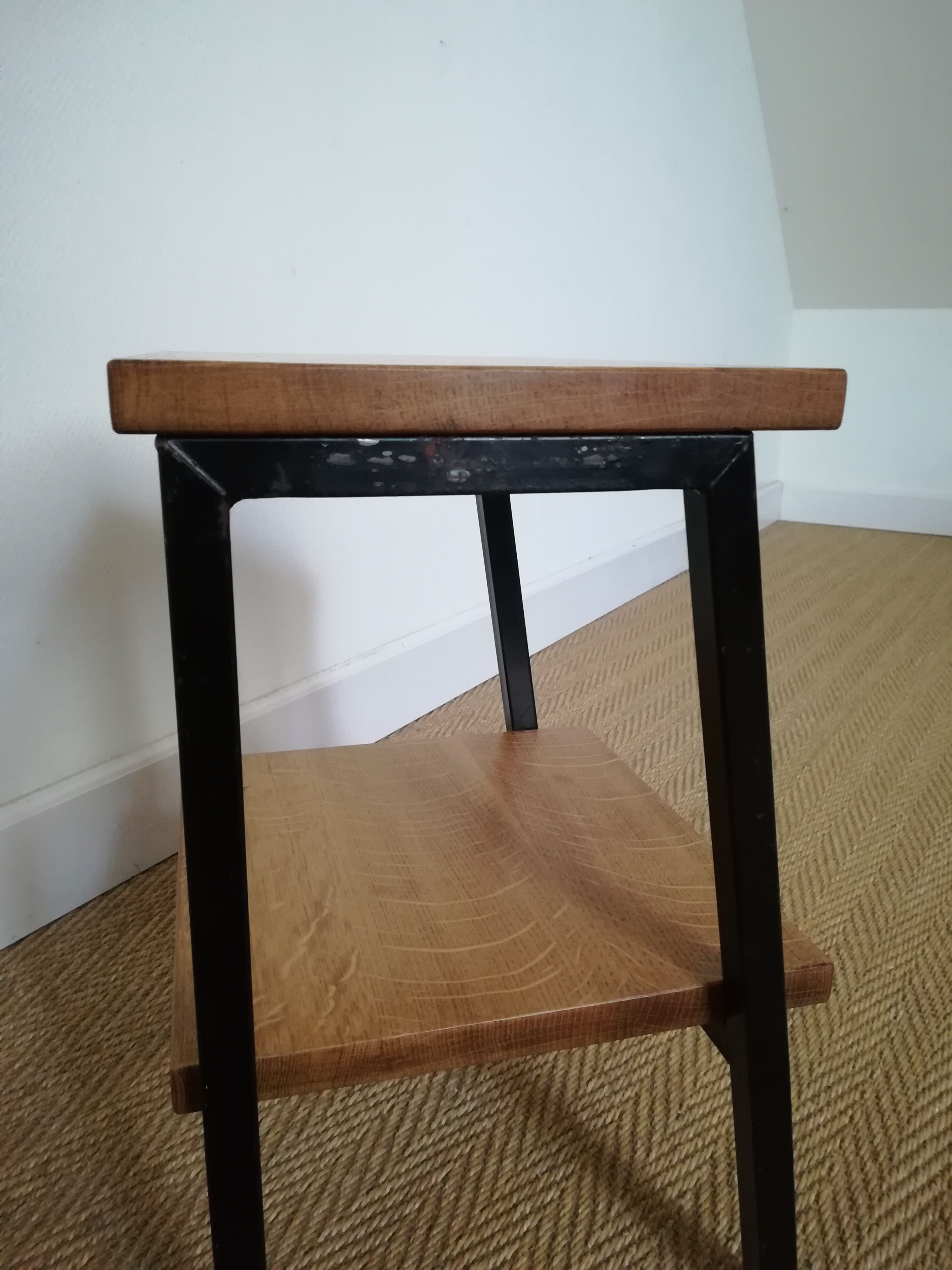 A pair of bedside tables