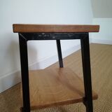 A pair of bedside tables
