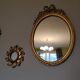 Louis XVI mirror in gold resin decorated with knots 44x62cm