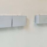 Pair of vintage wall lights, curved white metal, France 1980
