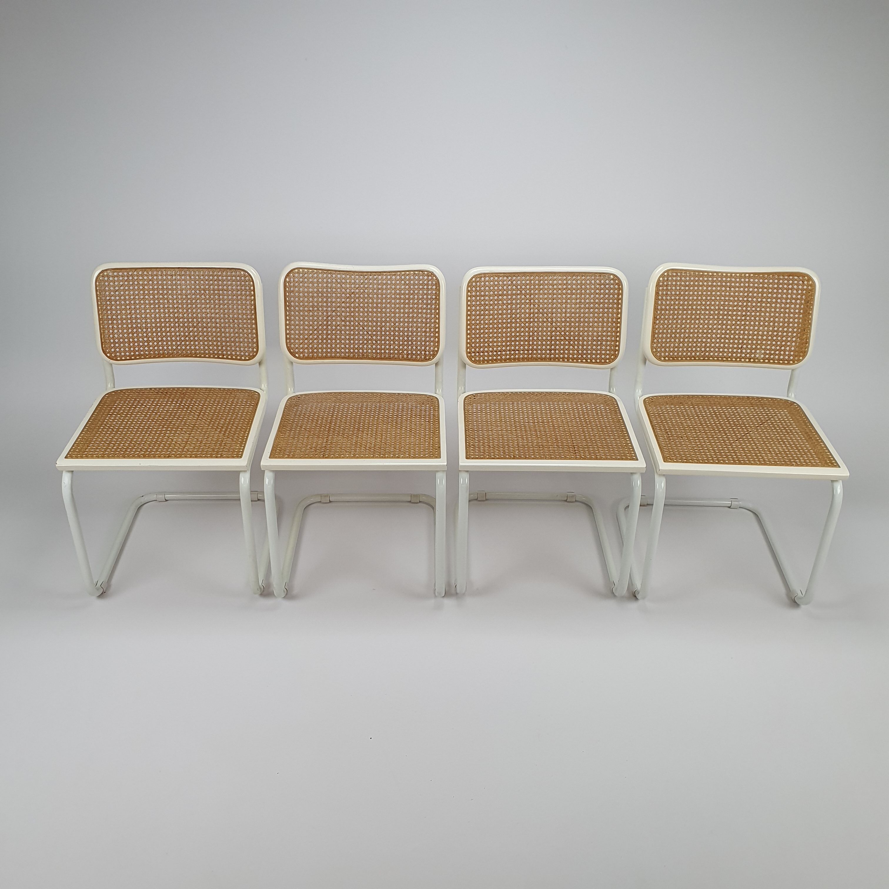 Set of 4 Tubular Frame and Cane Cantilever dining chairs, Italy, 1980s