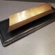 Set office stitched leather and brass wears feather pens