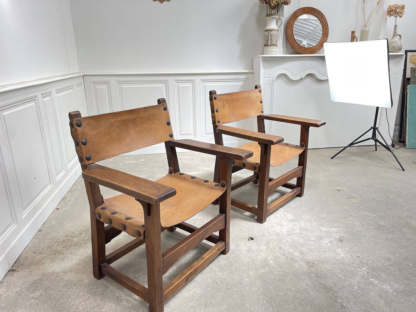 Pair of leather and walnut armchairs from the 1950s
