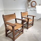 Pair of leather and walnut armchairs from the 1950s