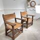 Pair of leather and walnut armchairs from the 1950s