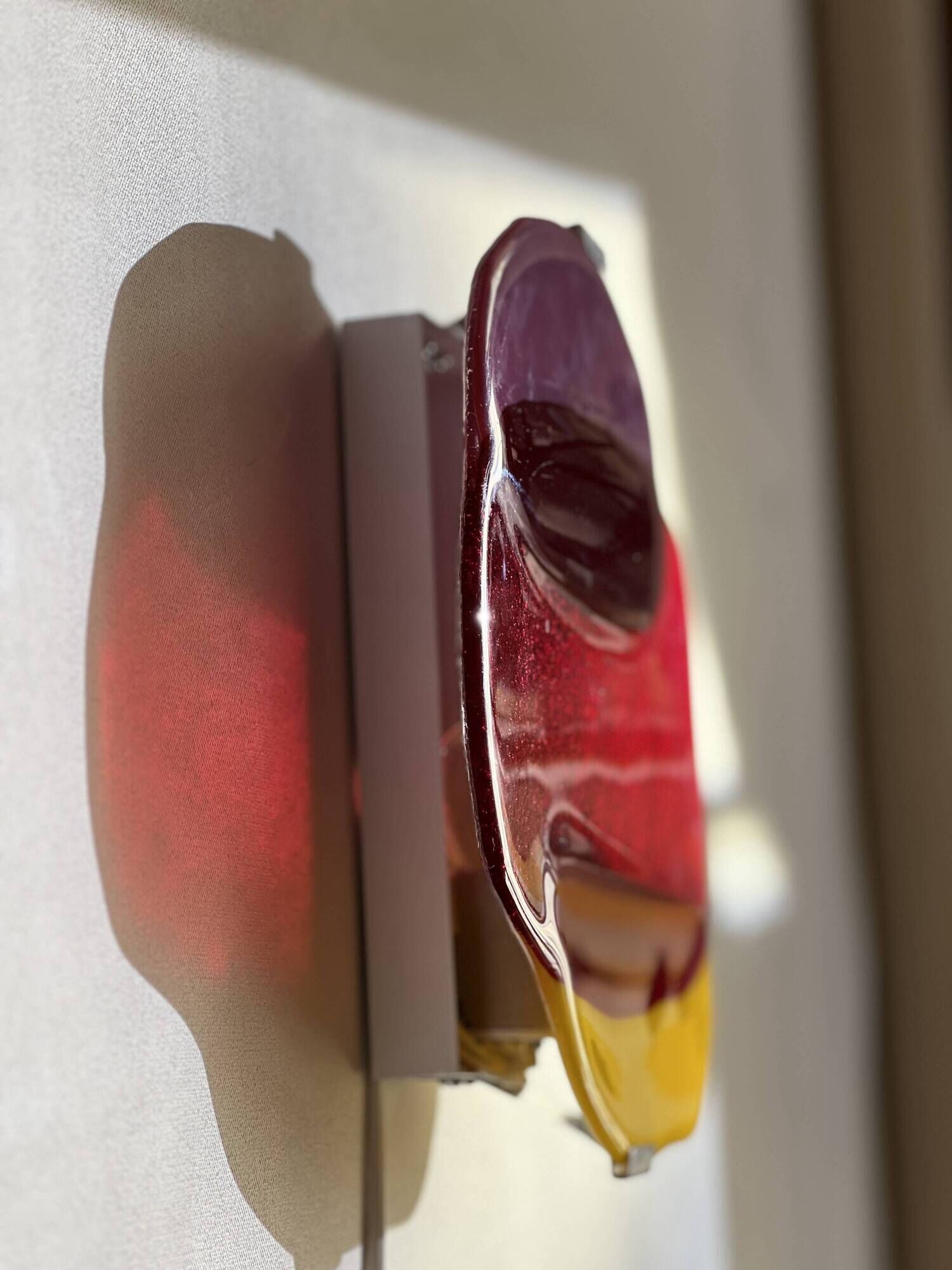 Handcrafted glass wall light