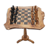 a large chess table made of olive wood