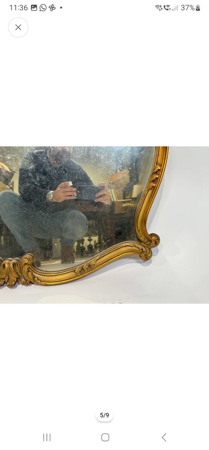 Antique mirror, 20th century, Louis XV style, gilded.