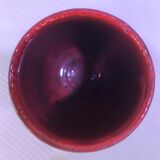 Red ceramic vase with free patterns