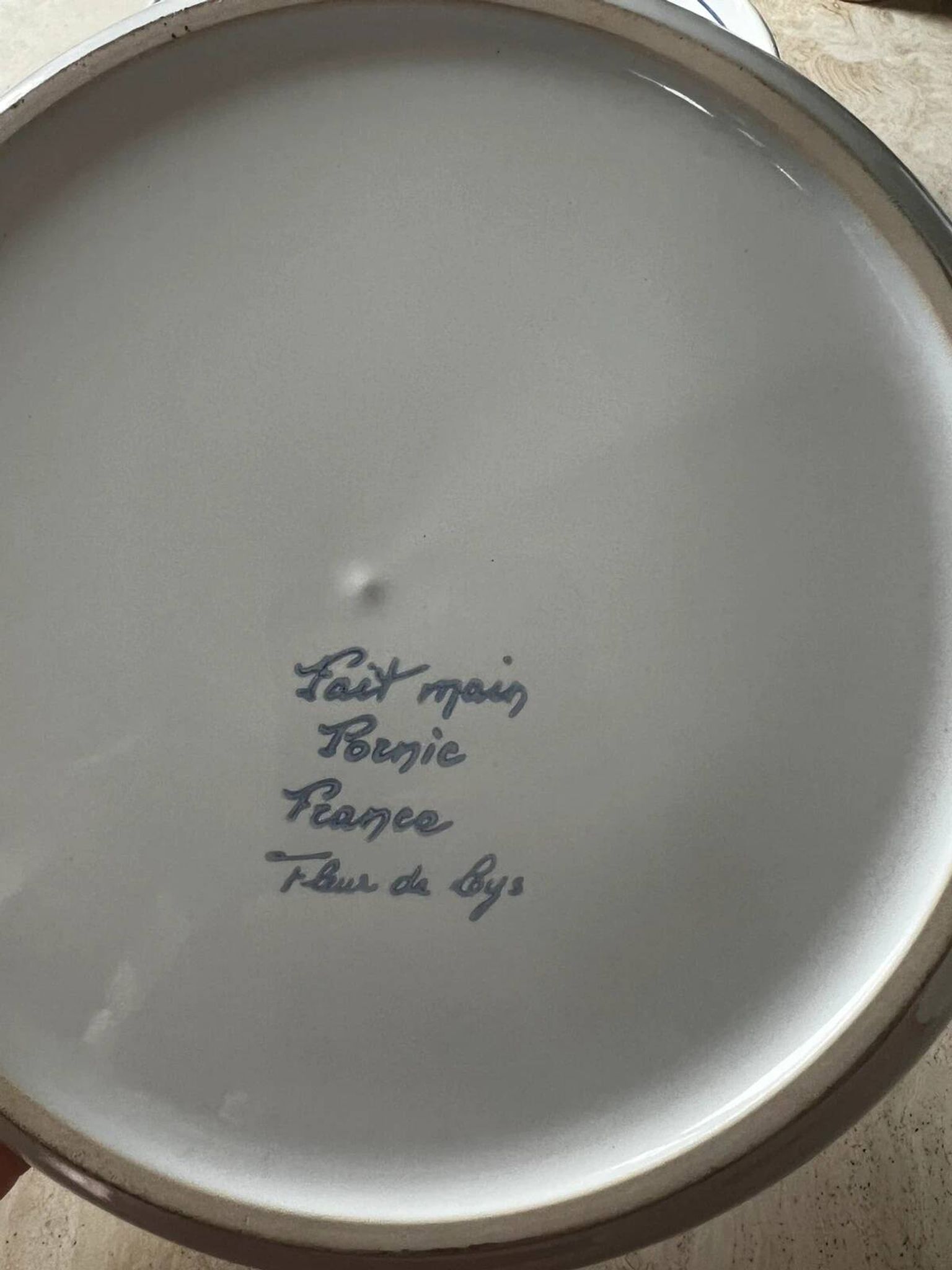 Fruit strainer in earthenware, Pornic, lily flower design.