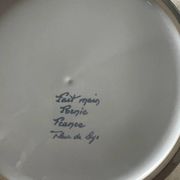 Fruit strainer in earthenware, Pornic, lily flower design.